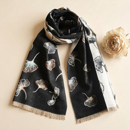  Black cashmere-feel large size women scarf styled with a dried flower. This winter scarf is reversible, one side black, another side cream. The clear ginkgo leaf pattern showing the winter shawl is crafted in high-end workmanship. This fashion scarf is reversible and large size, approx. width 65 cm, length 180 cm and weight 330g.