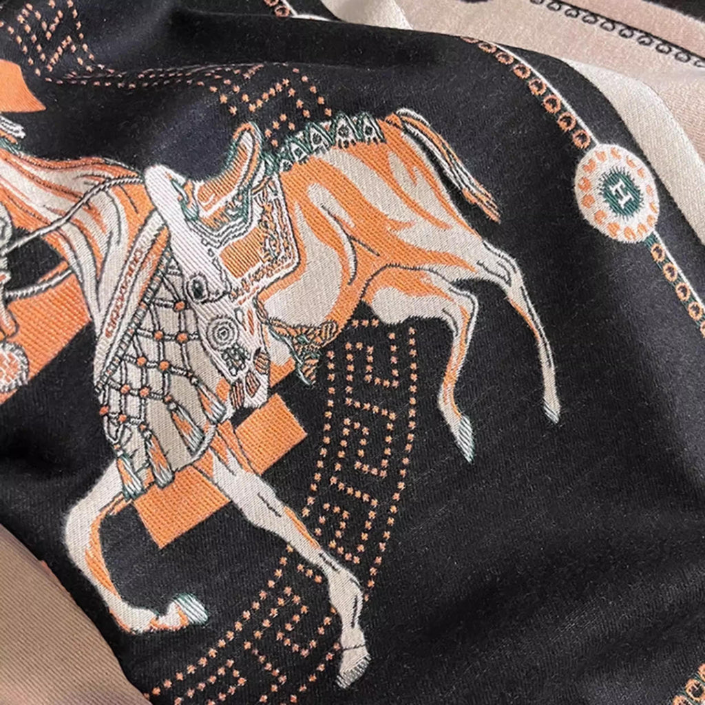 Close-up of black scarf with ivory border fabric showing horse pattern
