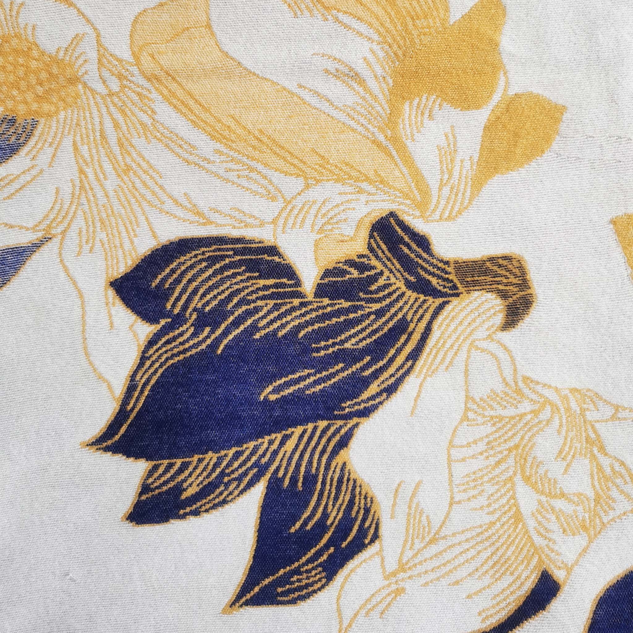 Close-up of navy and yellow floral pattern winter women scarf shows cashmere-feel fabric. The clear pattern crafted with high-end workmanship which looks an affordable luxury scarf..