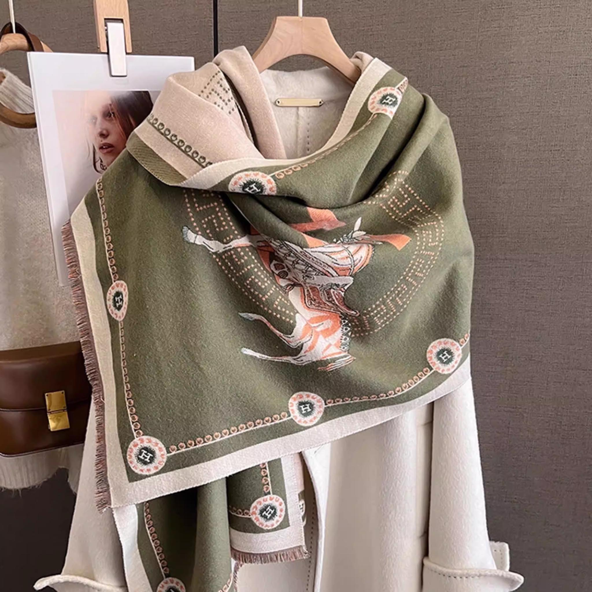 oliver green elegant jacquard shawl horse motif cashmere-feel scarf draped on hanger with white coat